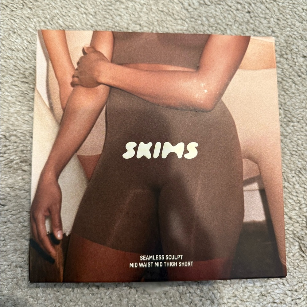 SKIMS Mid Waist Thigh Shorts in Brown